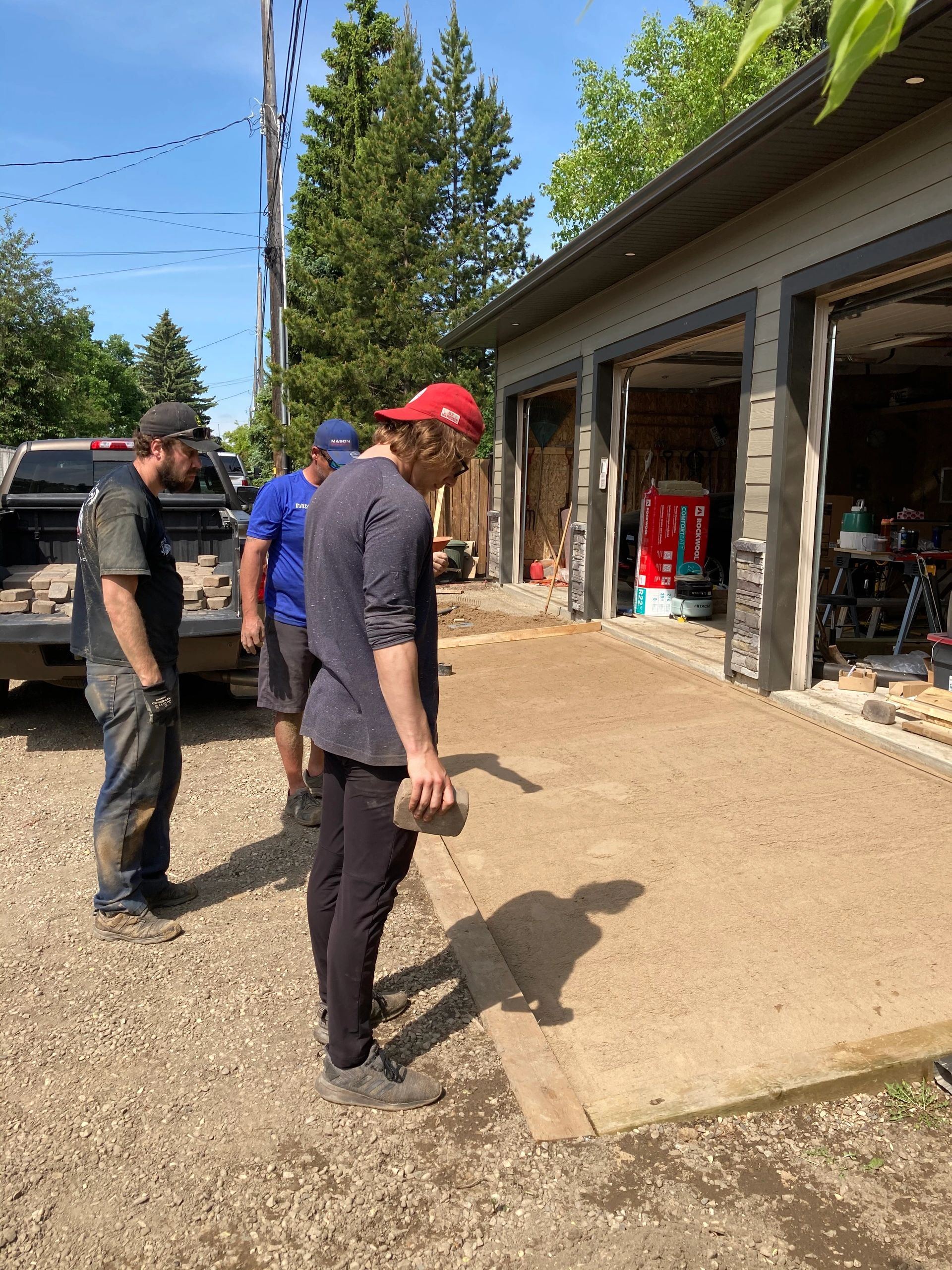 Power raking a thatch-heavy lawn in Sturgeon County for spring growth